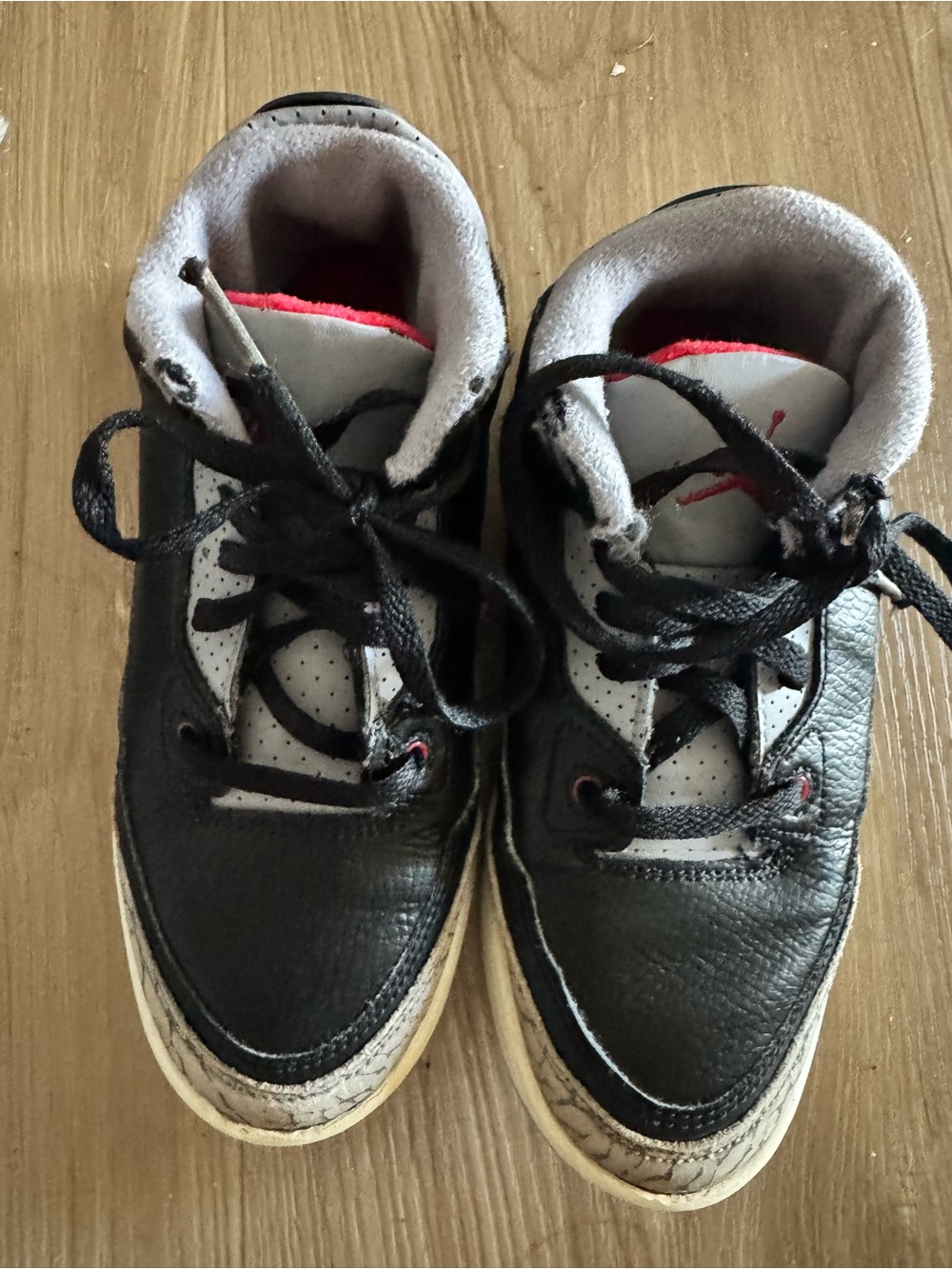Jordan Kids Black, White, and Red Low-Top Sneakers